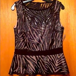 Beautiful shoulder cut lace and sequined top.